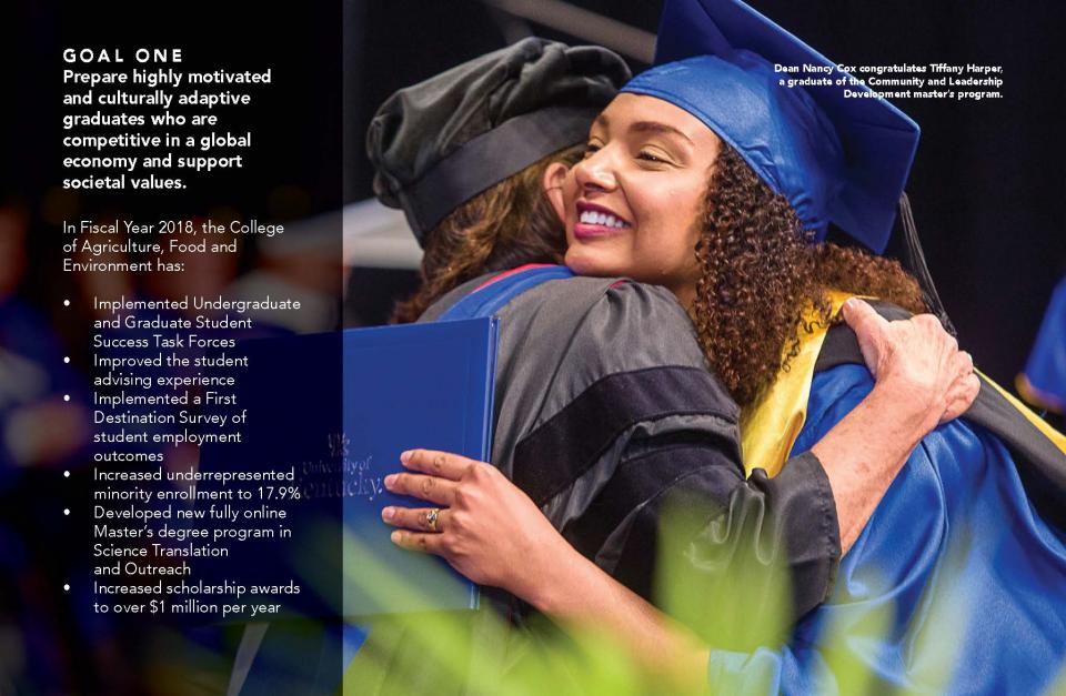 Dean Nancy Cox congratulates Tiffany Harper, a graduate of the Community and Leadership Development master's program.